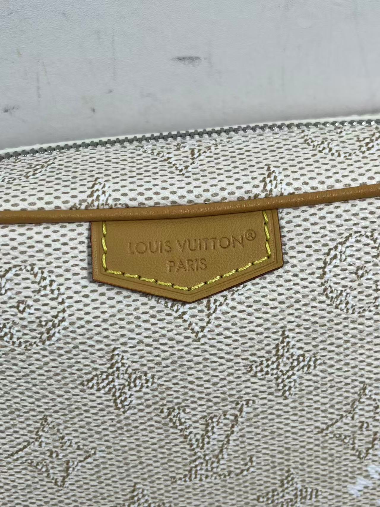 LV Trocadéro Wearable Wallet in Monogram Heritage coated canvas with natural cowhide-leather trim