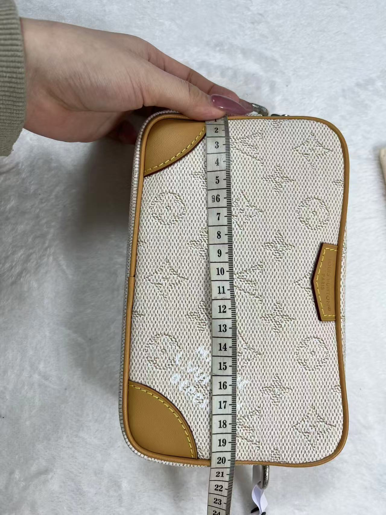 LV Trocadéro Wearable Wallet in Monogram Heritage coated canvas with natural cowhide-leather trim