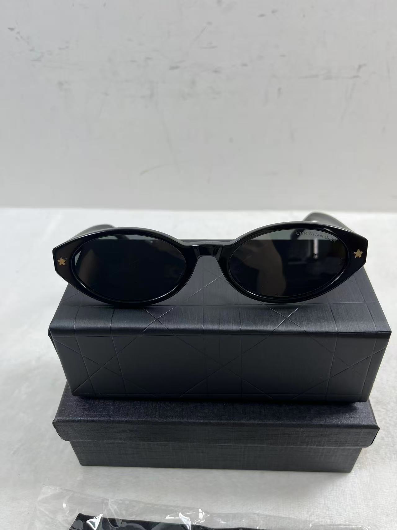 Dior Eyewear DiorPacific R1I oval-frame acetate sunglasses in black with gold-tone star details