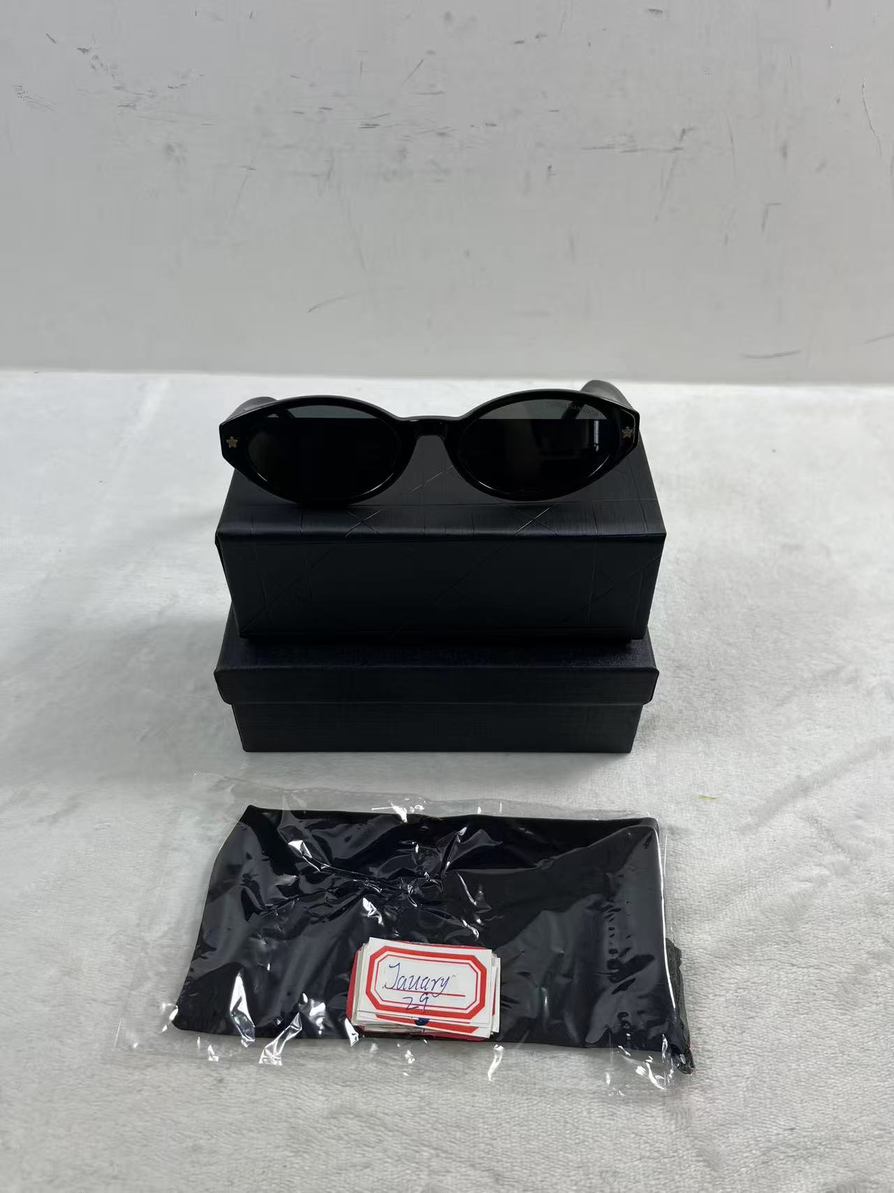 Dior Eyewear DiorPacific R1I oval-frame acetate sunglasses in black with gold-tone star details