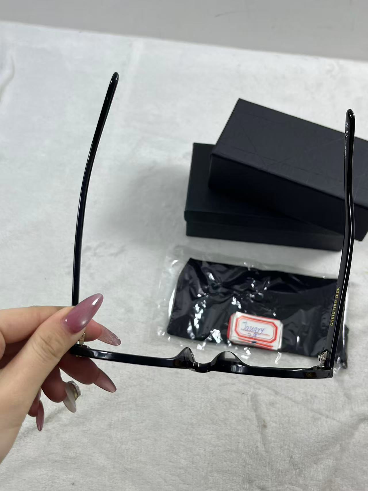 Dior Eyewear DiorPacific R1I oval-frame acetate sunglasses in black with gold-tone star details