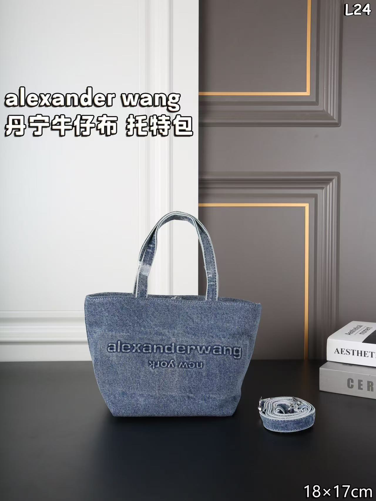 Alexander Wang Medium Punch denim tote bag in a vintage medium indigo wash