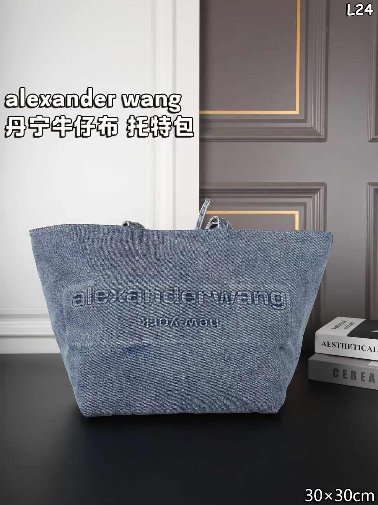 Alexander Wang Medium Punch denim tote bag in a vintage medium indigo wash