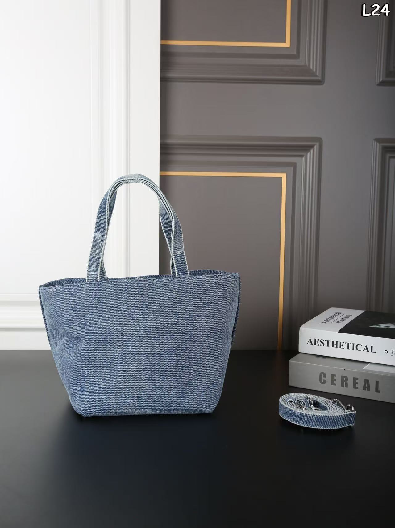 Alexander Wang Medium Punch denim tote bag in a vintage medium indigo wash