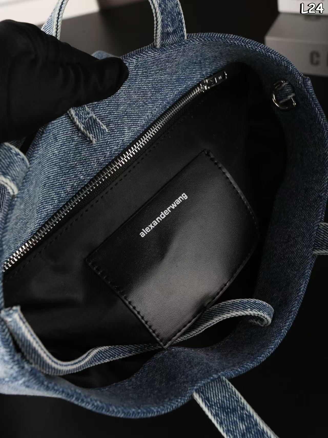 Alexander Wang Medium Punch denim tote bag in a vintage medium indigo wash