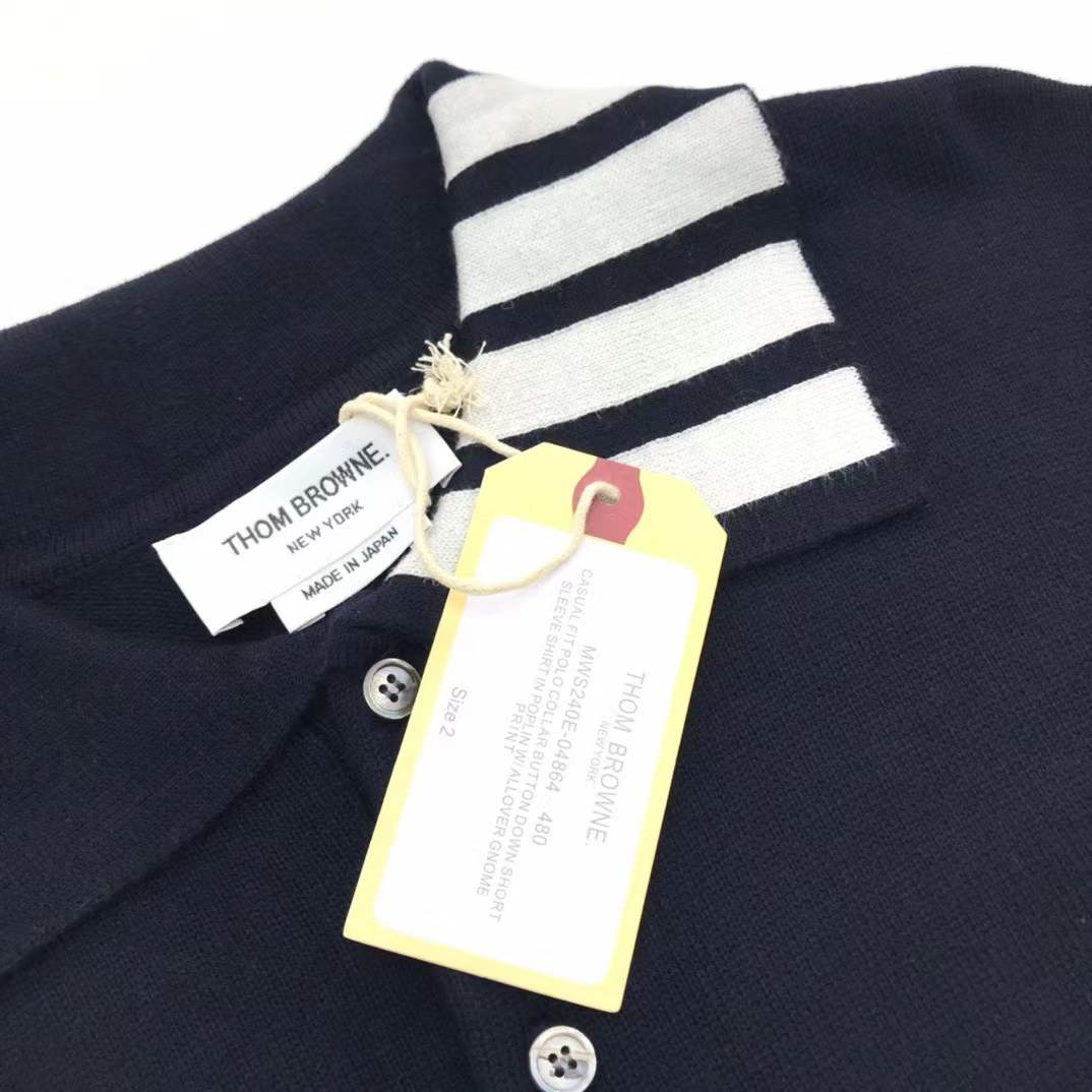 Thom Browne 4-Bar merino wool knitted polo in navy blue