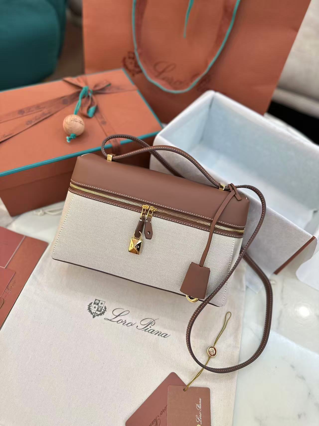 Loro Piana Extra Bag L27 in a natural/caramel sugar colorway cotton and linen blend with leather trim