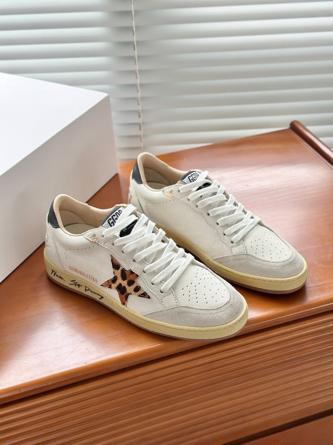 Golden Goose Ball Star sneakers in white nappa leather with a chicory-coffee glitter star and a black leather heel tab