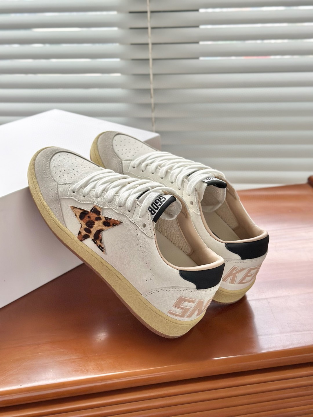 Golden Goose Ball Star sneakers in white nappa leather with a chicory-coffee glitter star and a black leather heel tab