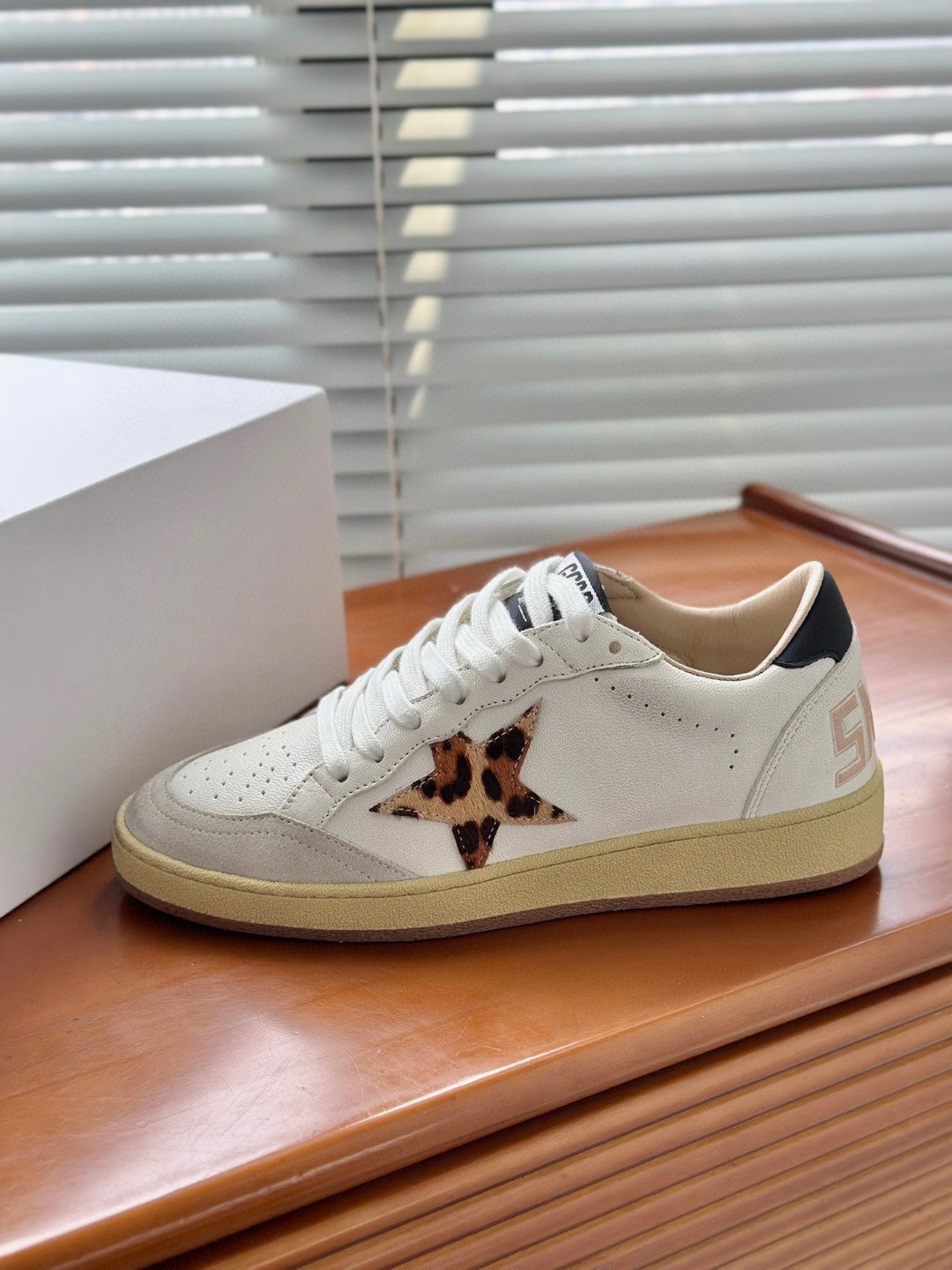 Golden Goose Ball Star sneakers in white nappa leather with a chicory-coffee glitter star and a black leather heel tab