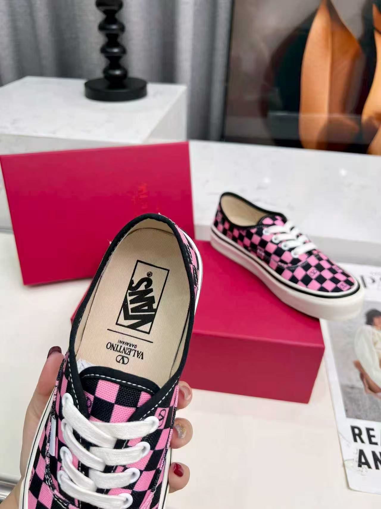 Valentino Garavani and Vans Classic Slip-On sneaker in fabric with a pink orchid and black VLogo Checkerboard print