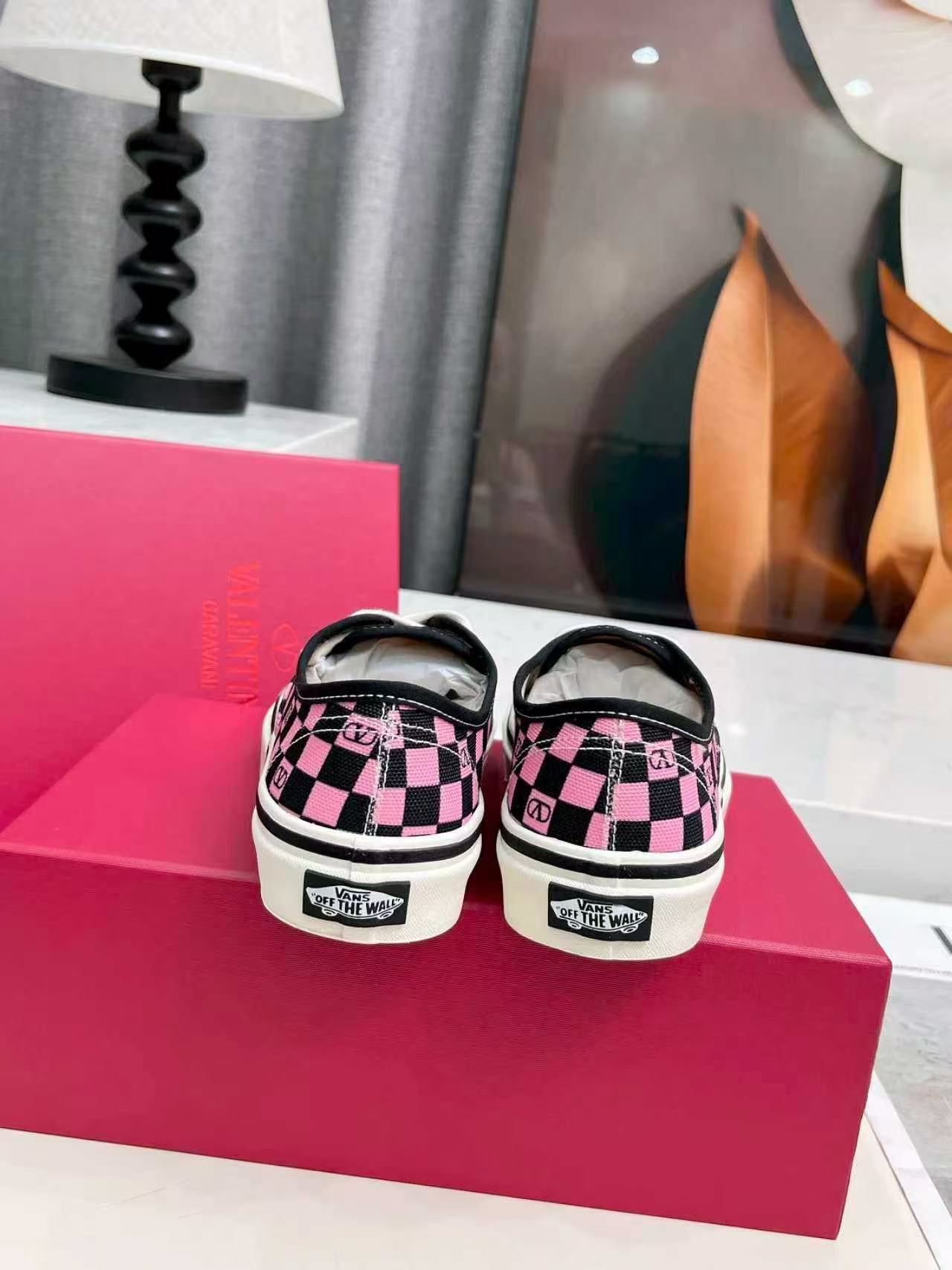 Valentino Garavani and Vans Classic Slip-On sneaker in fabric with a pink orchid and black VLogo Checkerboard print
