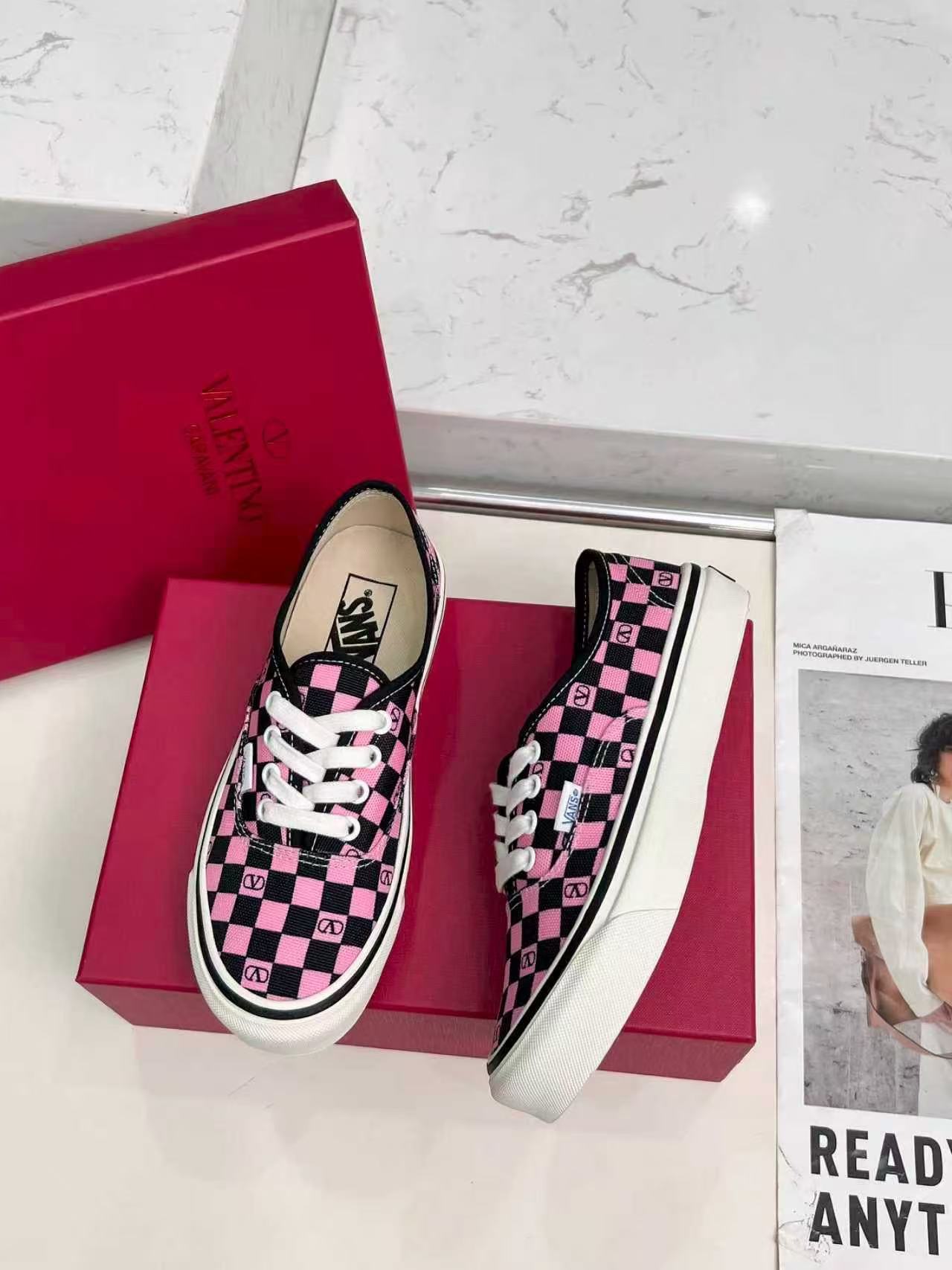 Valentino Garavani and Vans Classic Slip-On sneaker in fabric with a pink orchid and black VLogo Checkerboard print