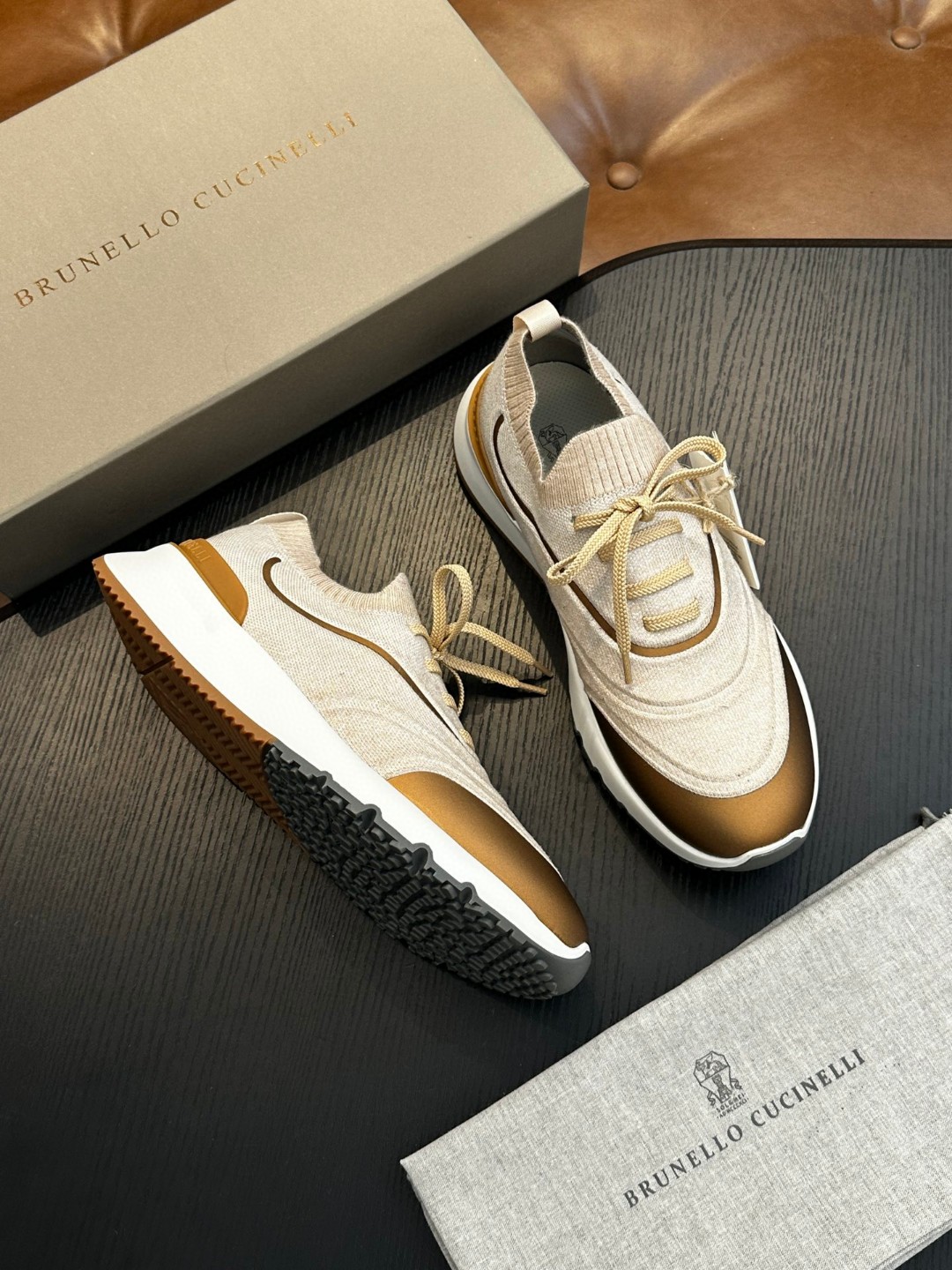 Brunello Cucinelli women's sneakers with a knitted construction and a rubber outsole