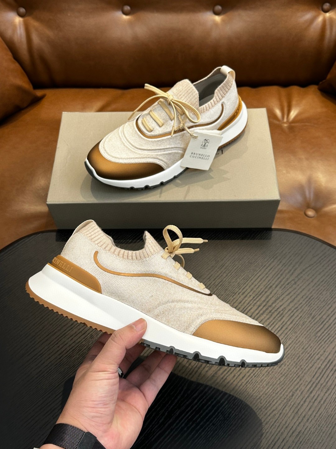 Brunello Cucinelli women's sneakers with a knitted construction and a rubber outsole