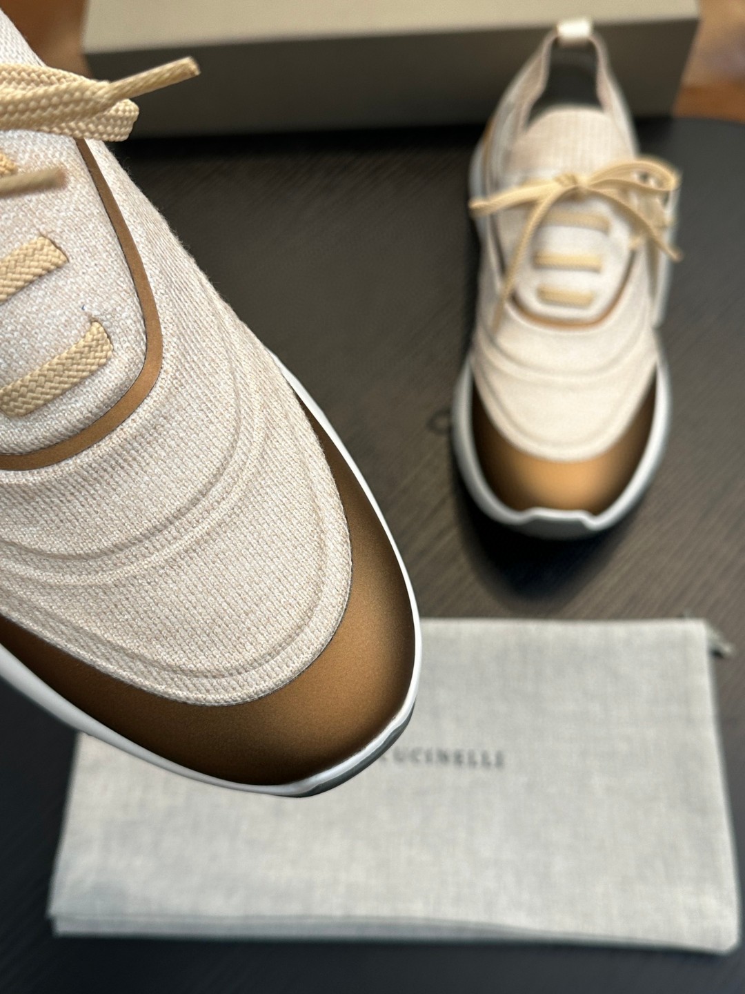 Brunello Cucinelli women's sneakers with a knitted construction and a rubber outsole