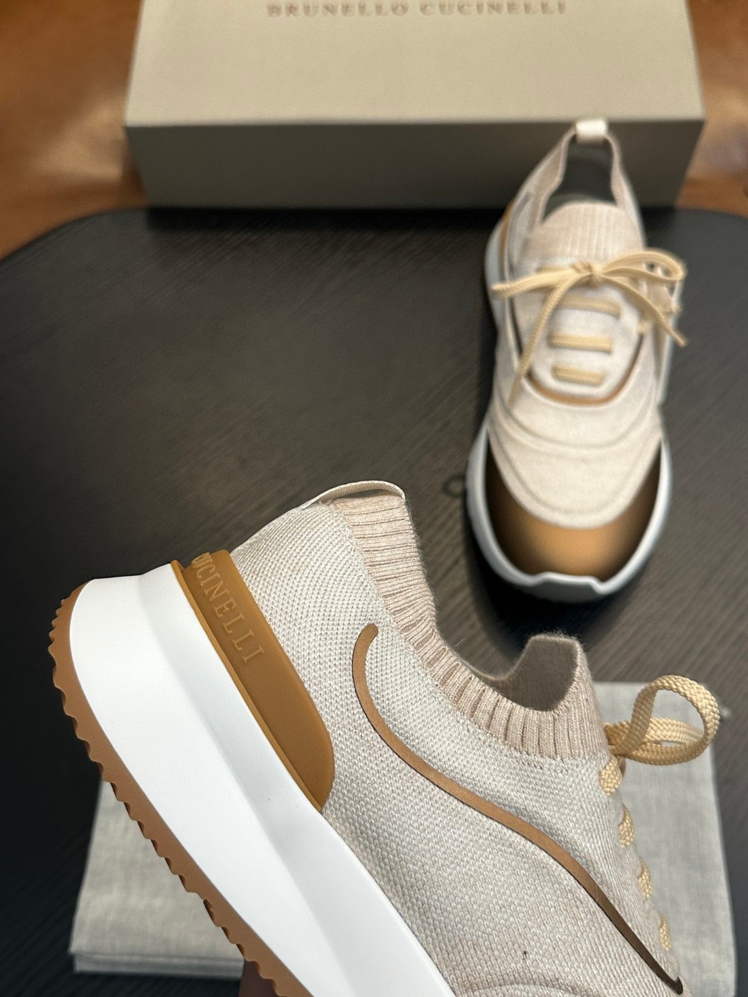 Brunello Cucinelli women's sneakers with a knitted construction and a rubber outsole