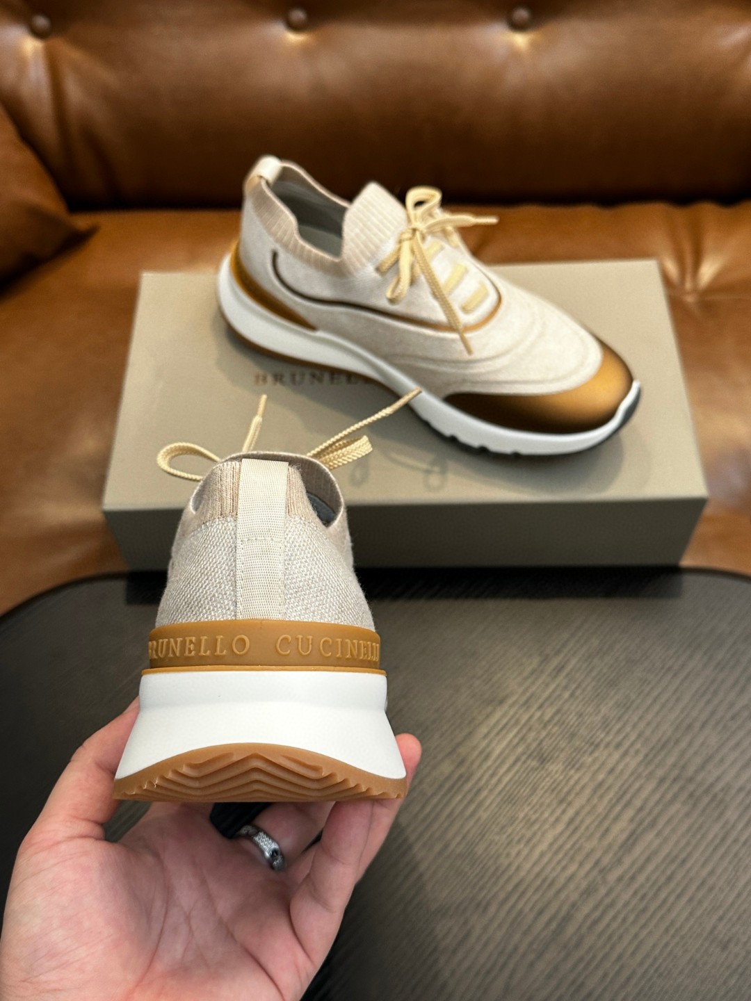 Brunello Cucinelli women's sneakers with a knitted construction and a rubber outsole