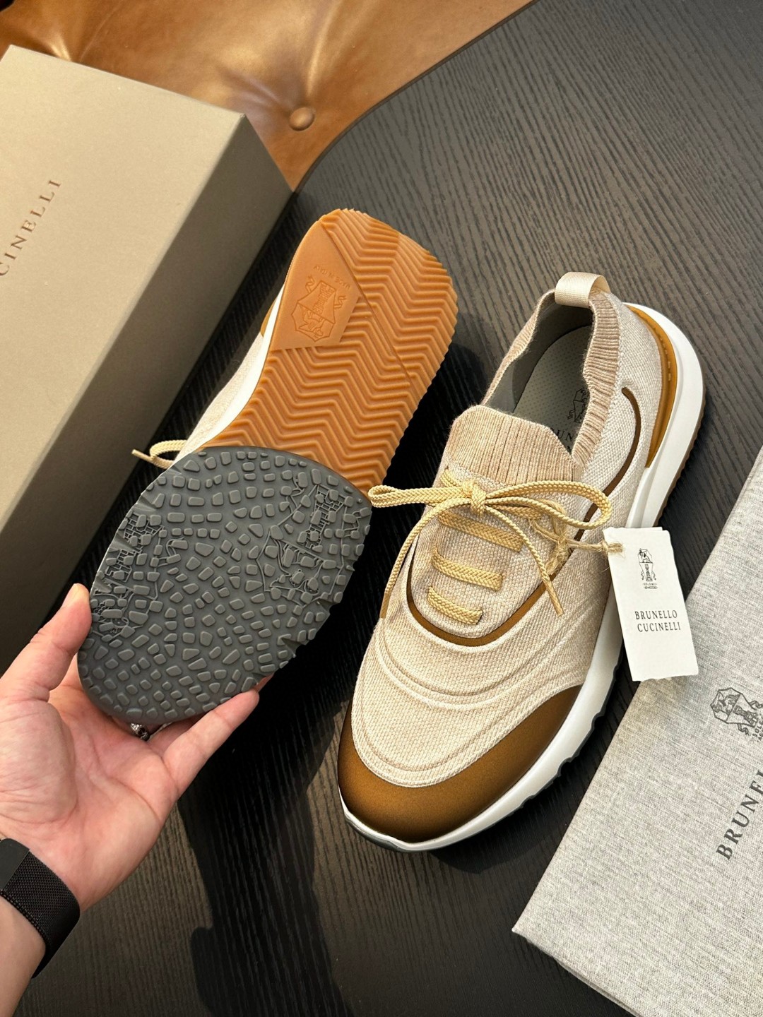 Brunello Cucinelli women's sneakers with a knitted construction and a rubber outsole