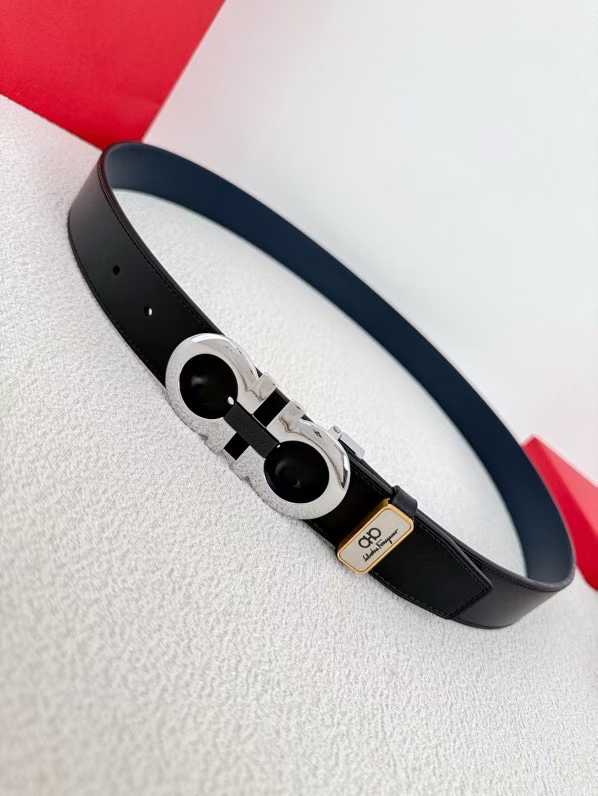 Ferragamo Gancini reversible leather belt featuring a gold-tone buckle