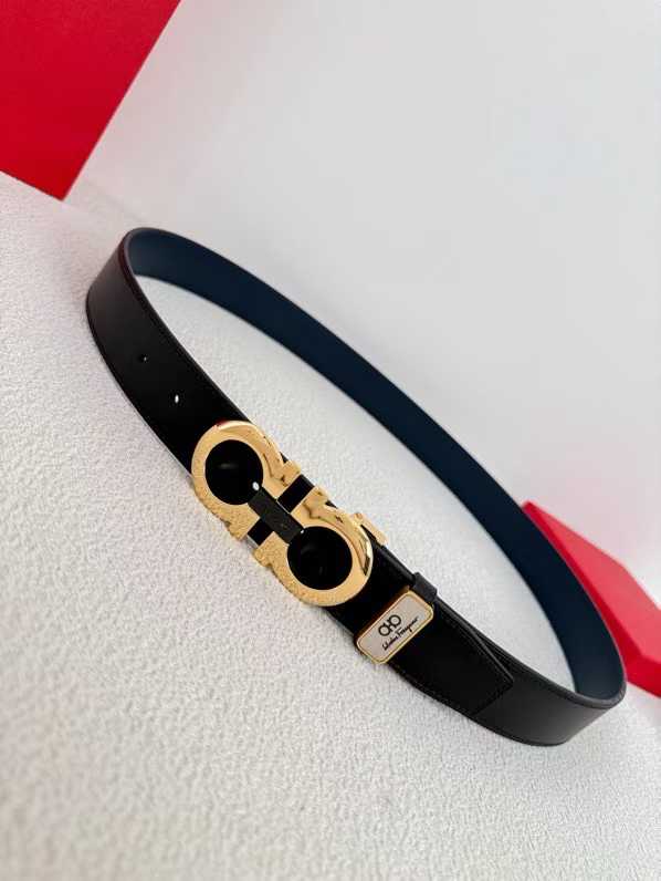 Ferragamo Gancini reversible leather belt featuring a gold-tone buckle