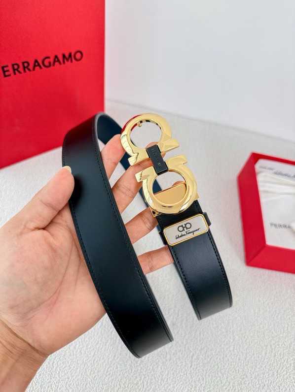 Ferragamo Gancini reversible leather belt featuring a gold-tone buckle