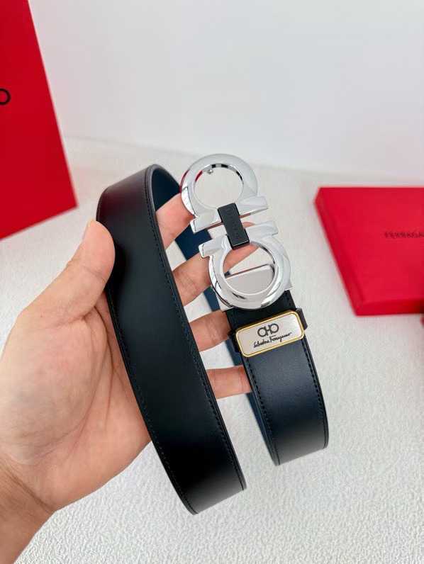 Ferragamo Gancini reversible leather belt featuring a gold-tone buckle