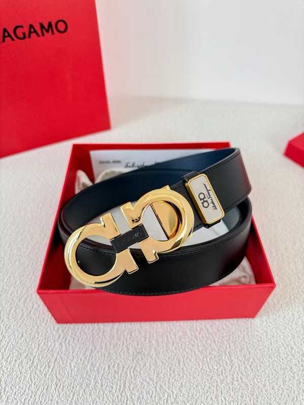 Ferragamo Gancini reversible leather belt featuring a gold-tone buckle