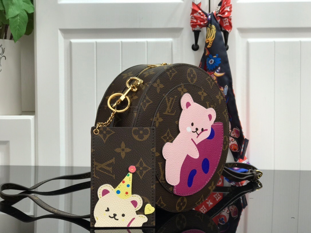 LV Monogram Vivienne Round Coin Purse likely from the Candy Factory capsule collection