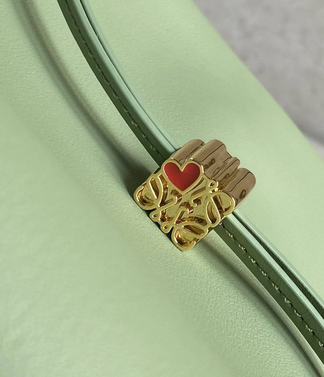 Loewe Small Cubi leather shoulder bag in green.