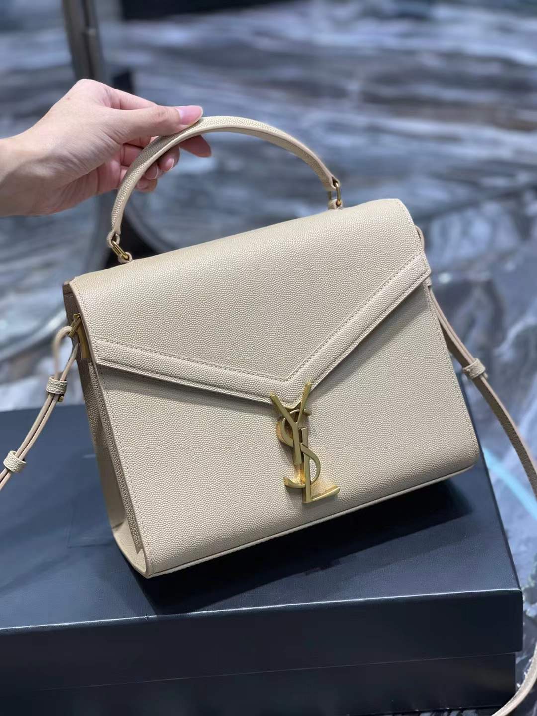 YSL Saint Laurent Cassandra Mini Top Handle Bag beige embossed leather