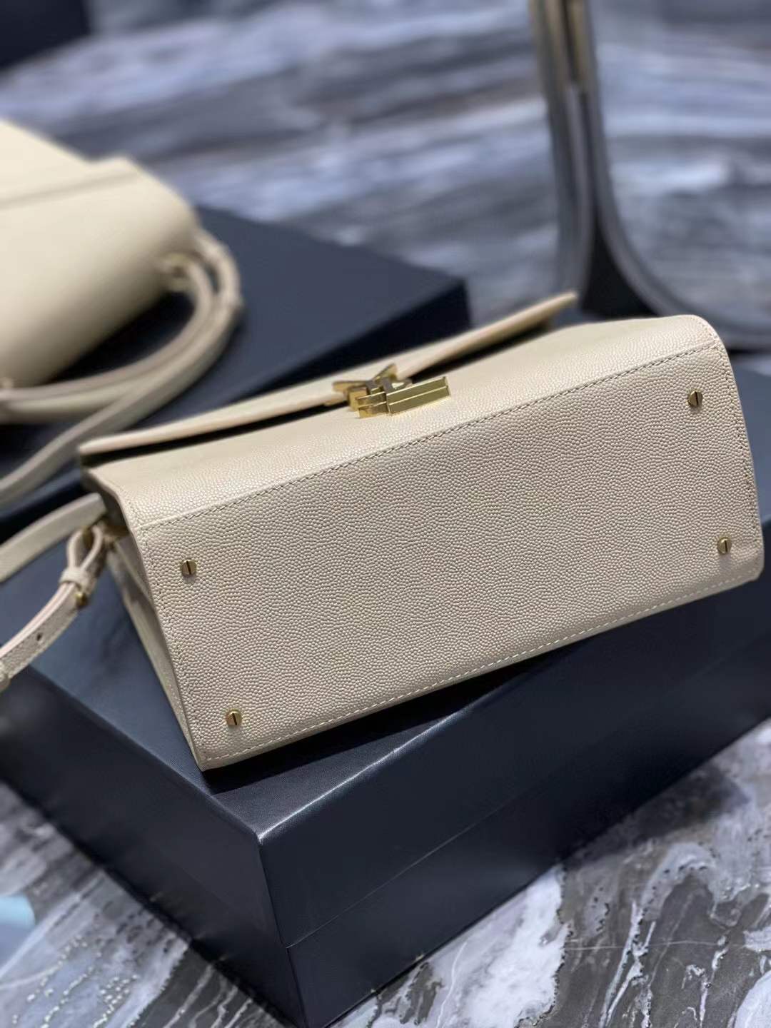 YSL Saint Laurent Cassandra Mini Top Handle Bag beige embossed leather