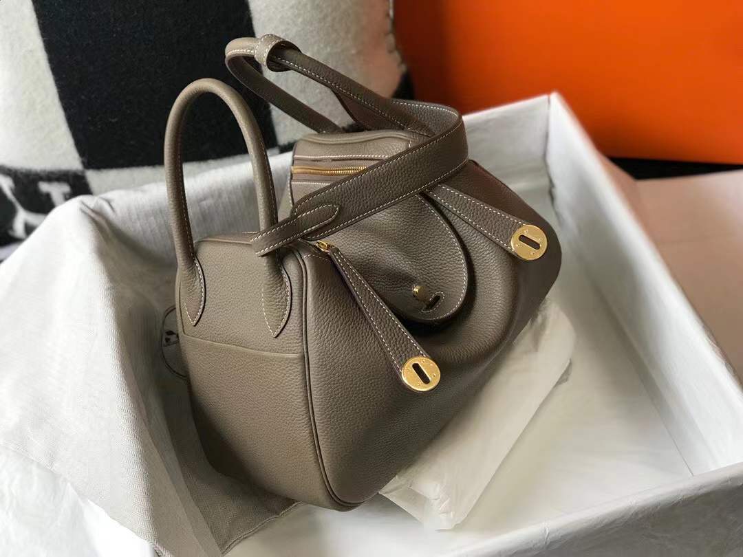 Hermès Lindy bag in Etoupe color with gold hardware.