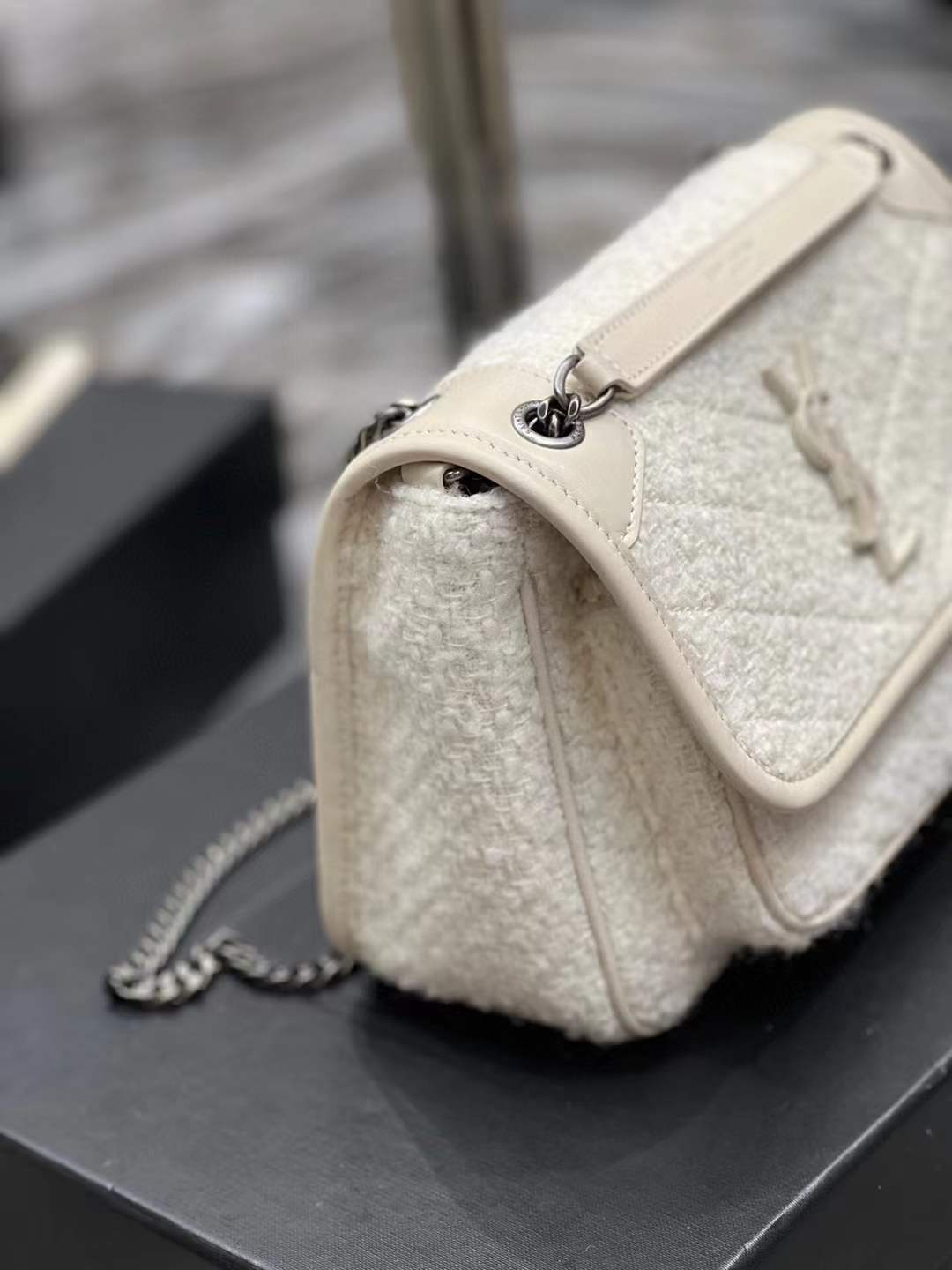 Saint Laurent Niki Baby shoulder bag in white vintage leather