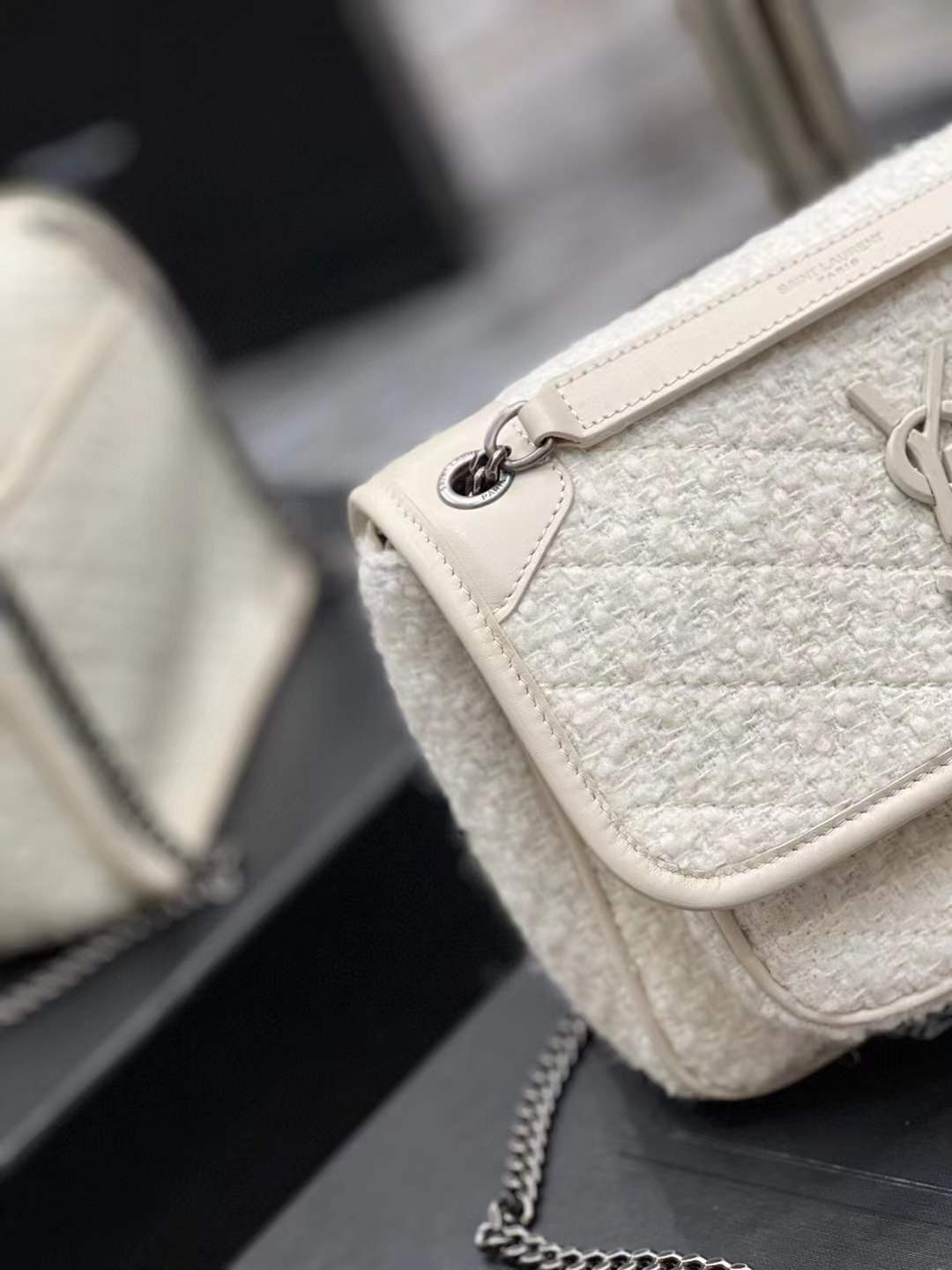 Saint Laurent Niki Baby shoulder bag in white vintage leather