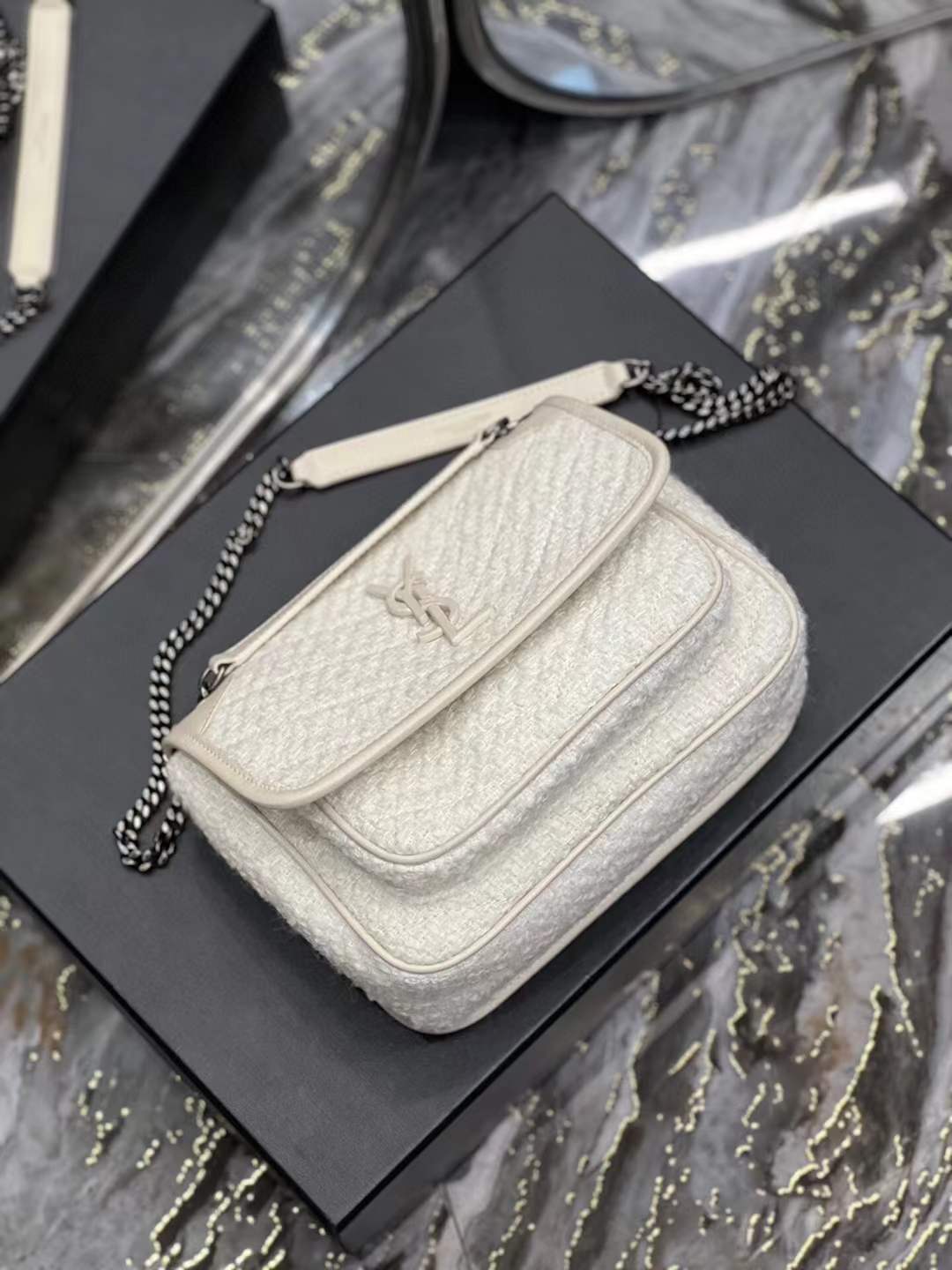 Saint Laurent Niki Baby shoulder bag in white vintage leather