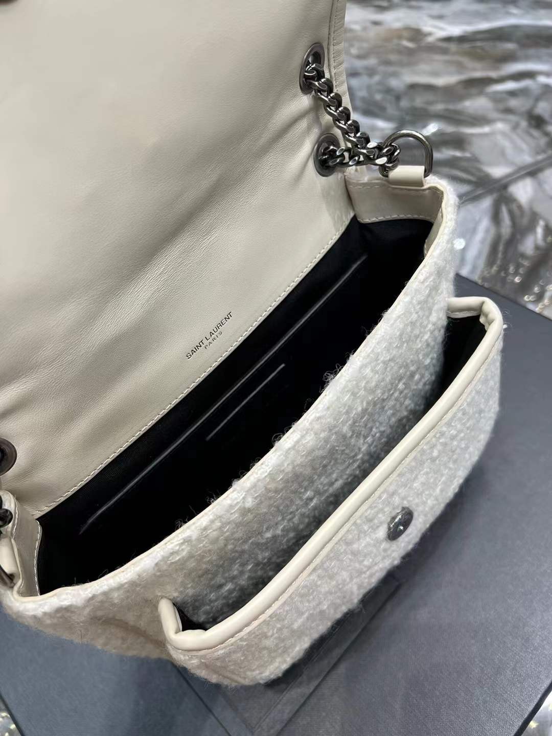 Saint Laurent Niki Baby shoulder bag in white vintage leather