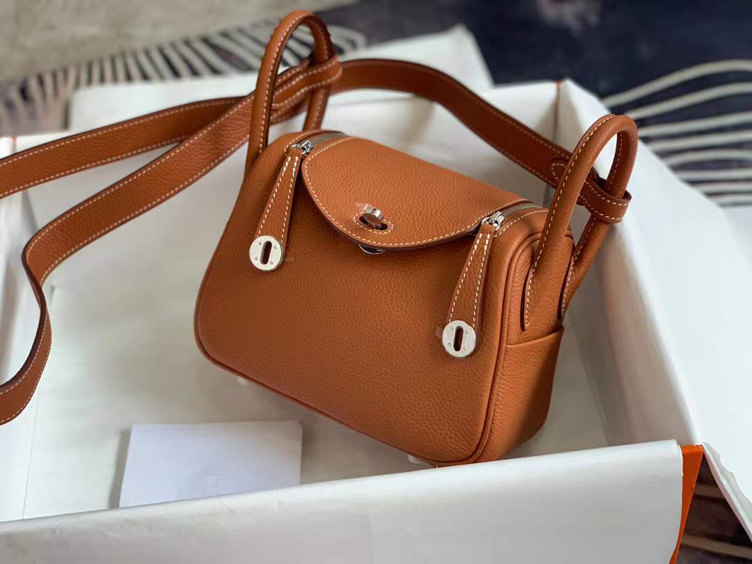 Hermès Mini Lindy bag in gold taurillon clemence leather with palladium hardware