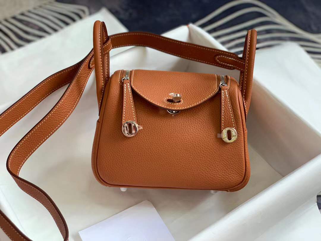 Hermès Mini Lindy bag in gold taurillon clemence leather with palladium hardware