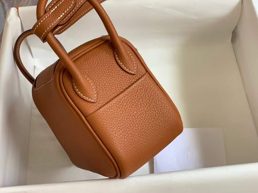 Hermès Mini Lindy bag in gold taurillon clemence leather with palladium hardware