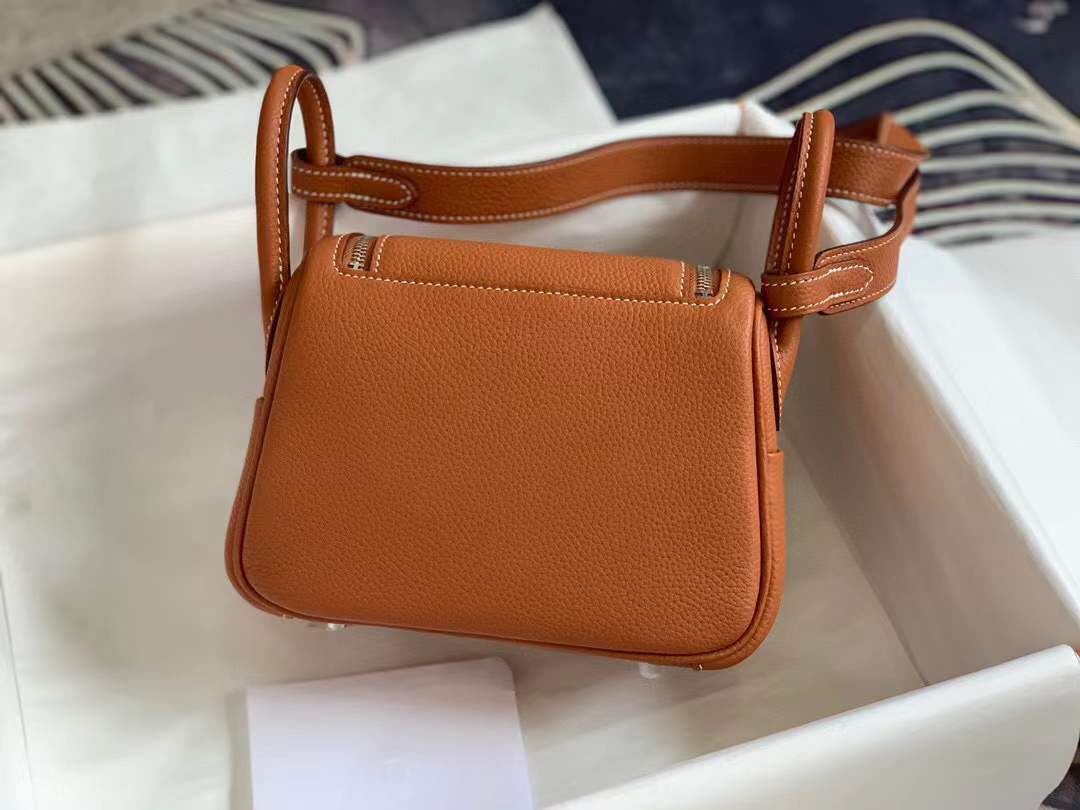 Hermès Mini Lindy bag in gold taurillon clemence leather with palladium hardware