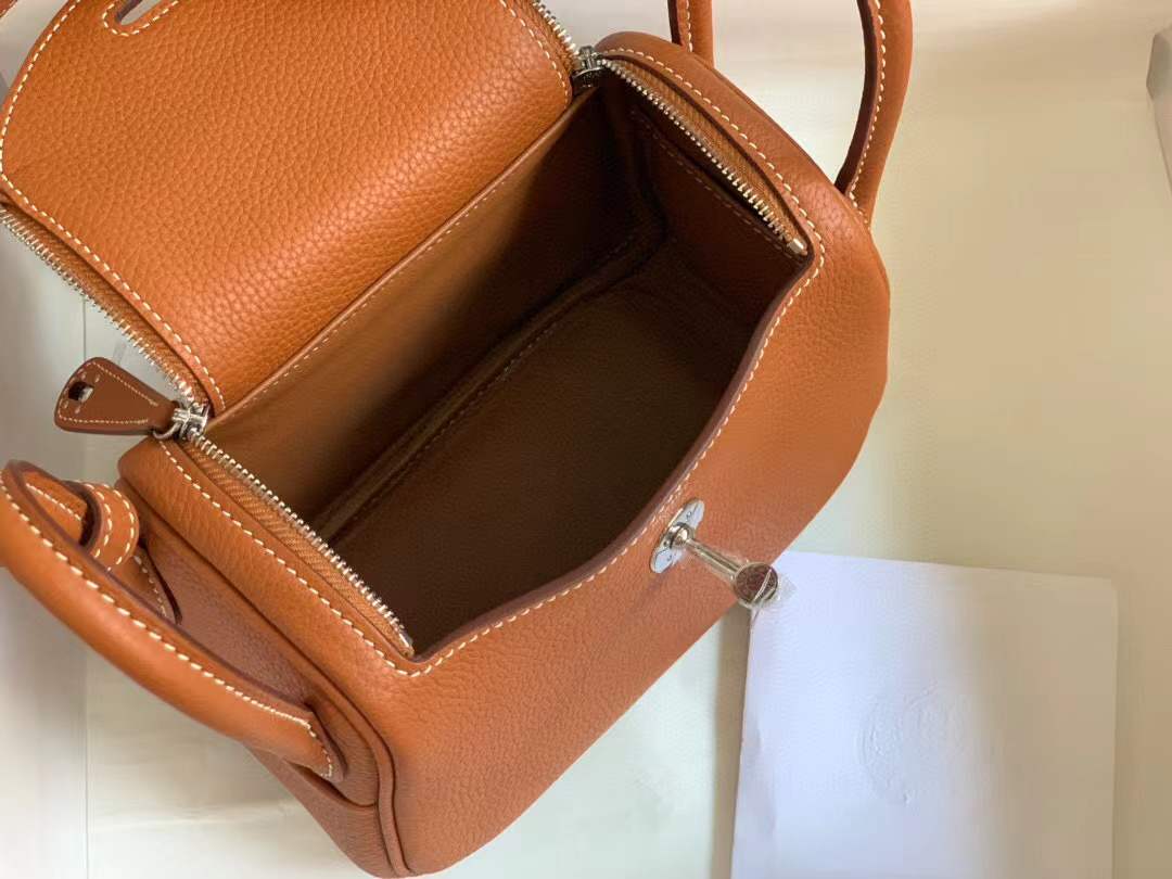 Hermès Mini Lindy bag in gold taurillon clemence leather with palladium hardware