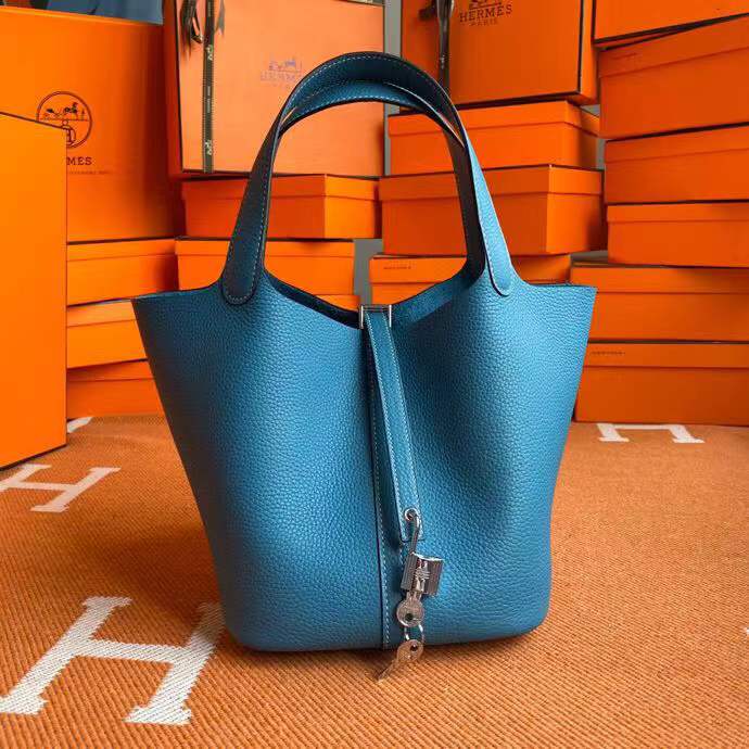 Hermès Picotin Lock 18 handbag likely in a blue shade such as New Blue Jean or Bleu Izmir crafted from Taurillon Clemence leather and featuring silver-toned hardware