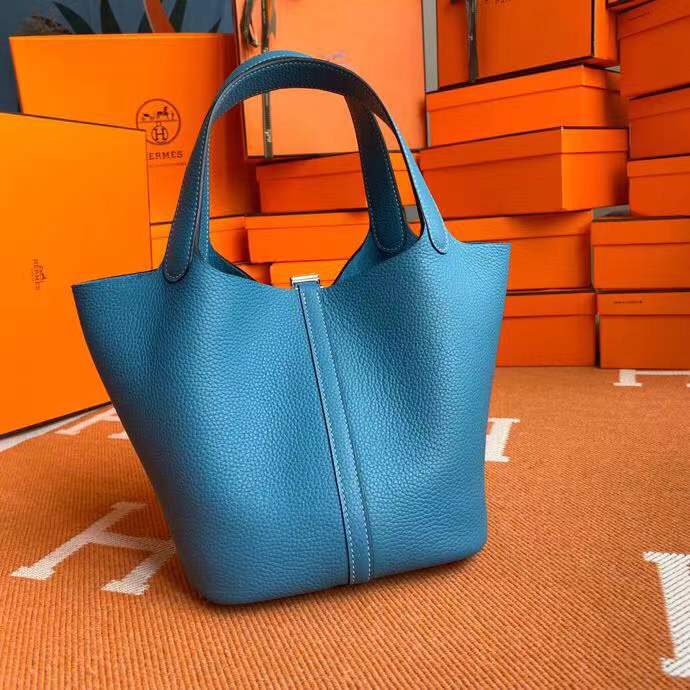 Hermès Picotin Lock 18 handbag likely in a blue shade such as New Blue Jean or Bleu Izmir crafted from Taurillon Clemence leather and featuring silver-toned hardware