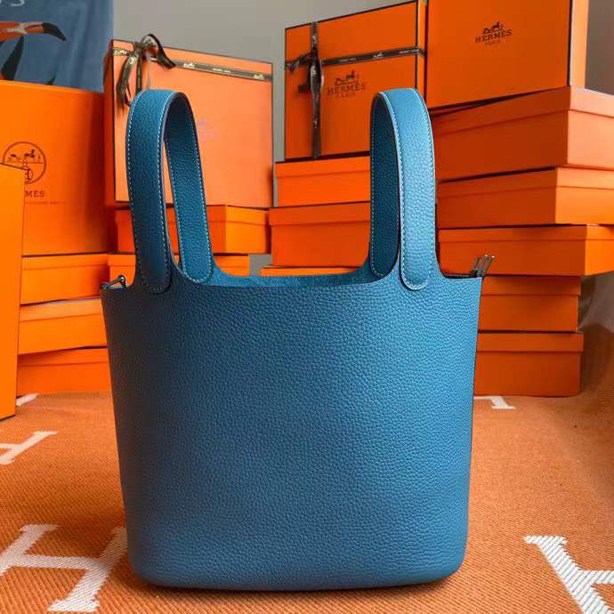 Hermès Picotin Lock 18 handbag likely in a blue shade such as New Blue Jean or Bleu Izmir crafted from Taurillon Clemence leather and featuring silver-toned hardware