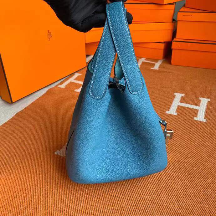 Hermès Picotin Lock 18 handbag likely in a blue shade such as New Blue Jean or Bleu Izmir crafted from Taurillon Clemence leather and featuring silver-toned hardware