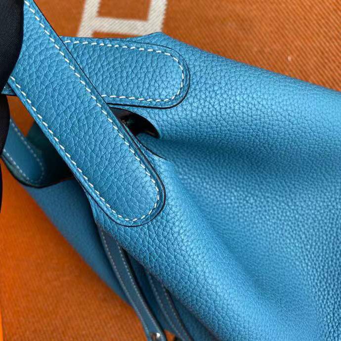 Hermès Picotin Lock 18 handbag likely in a blue shade such as New Blue Jean or Bleu Izmir crafted from Taurillon Clemence leather and featuring silver-toned hardware