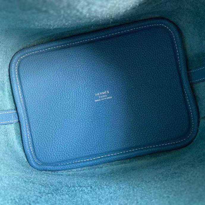 Hermès Picotin Lock 18 handbag likely in a blue shade such as New Blue Jean or Bleu Izmir crafted from Taurillon Clemence leather and featuring silver-toned hardware