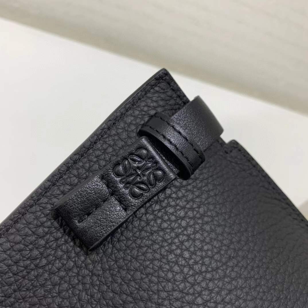 Loewe T Pouch in grained black leather featuring an embossed Anagram logo