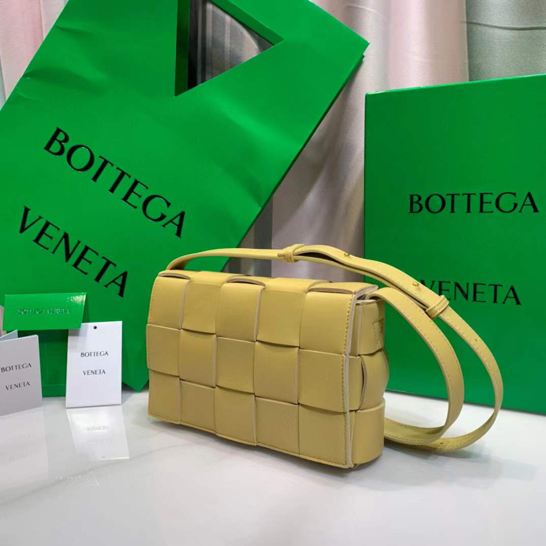 Bottega Veneta Cassette leather shoulder bag in a lemon yellow color